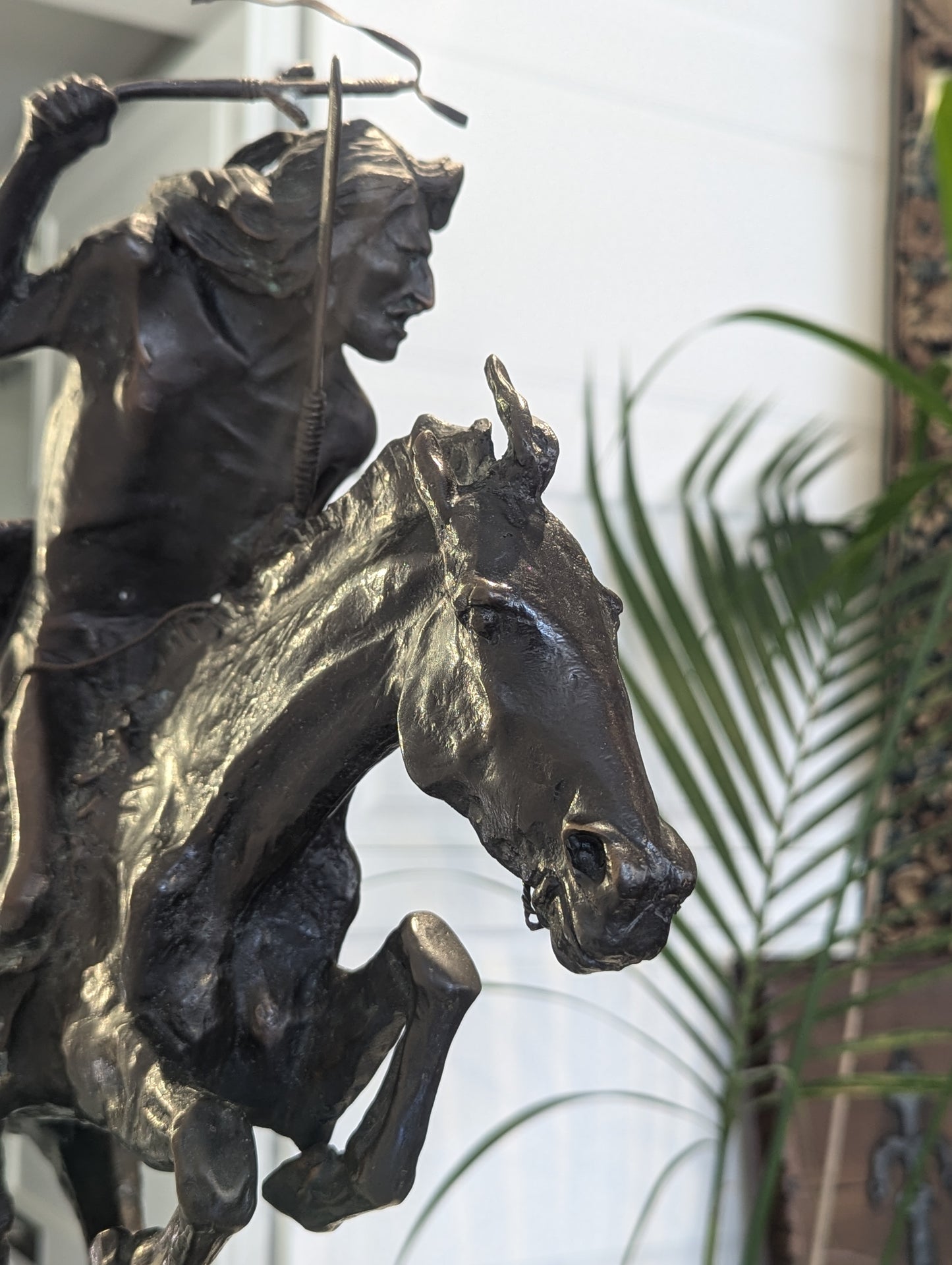 A briliant large bronze statue of a Native American (Cheyenne Tribe) warrior on horseback, marble base, signed