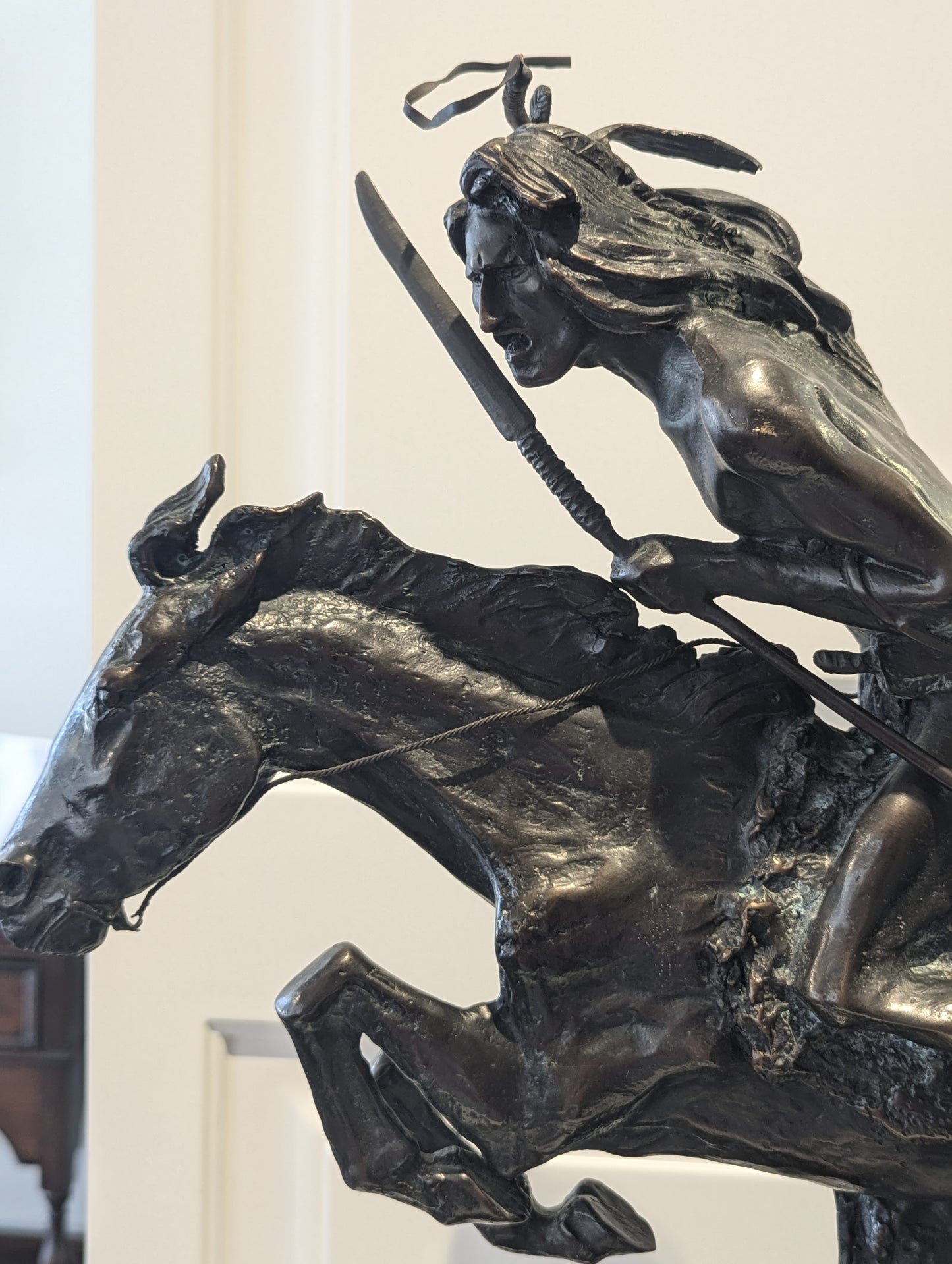 A briliant large bronze statue of a Native American (Cheyenne Tribe) warrior on horseback, marble base, signed