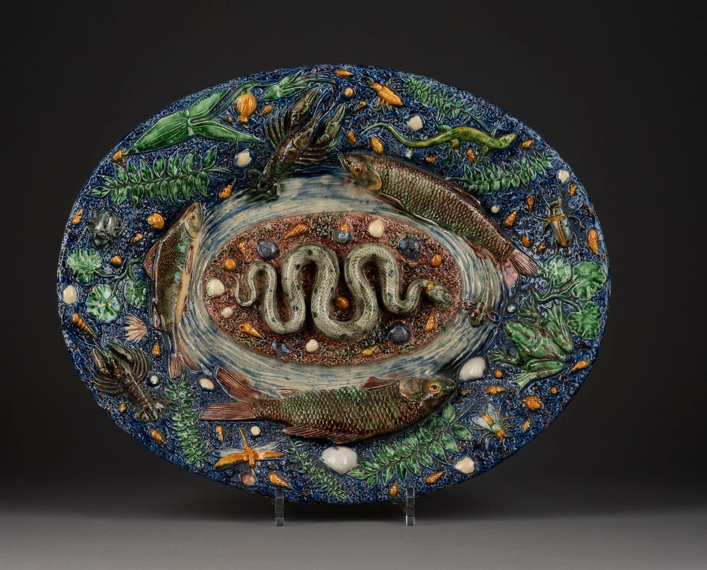 A Victorian tin-glazed platter in the manner of Bernards Palissy (1510 - 1589)