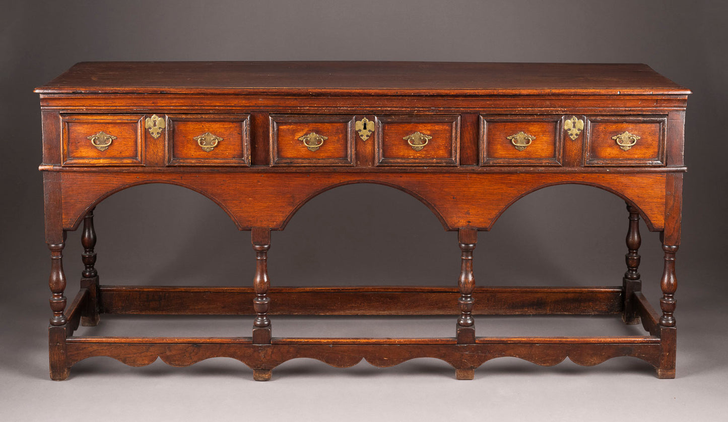 A Rare Spectacular Oak English Sideboard c.1700 on turned legs, original hand-forged escutcheons