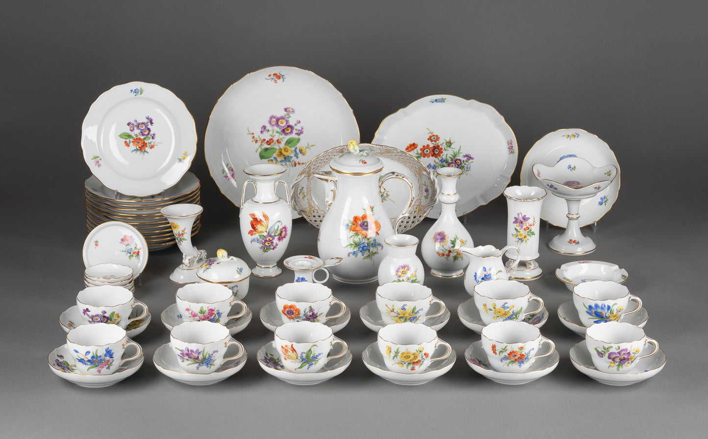 A spectacular Meissen (German) 58-Piece Hand Painted and Gilt Floral Porcelain Coffee Service c.1900, signed, dated, numbered