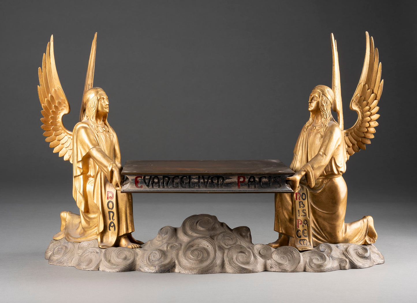 A magnificent signed bronze book stand, feat. 2 golden patinated genuflecting angels above clouds