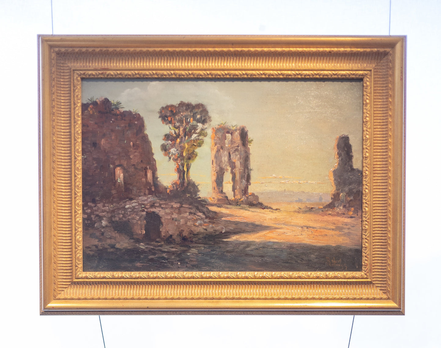 A signed landscape with ancient ruins in early morning light, Roberto Ramauge (Argentina 1890- Paris 1973)