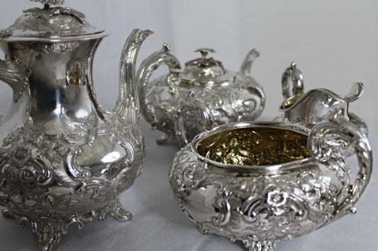 An impressive Four Piece Tea and Coffee Silver Service by renowned British silversmith, William Stroud