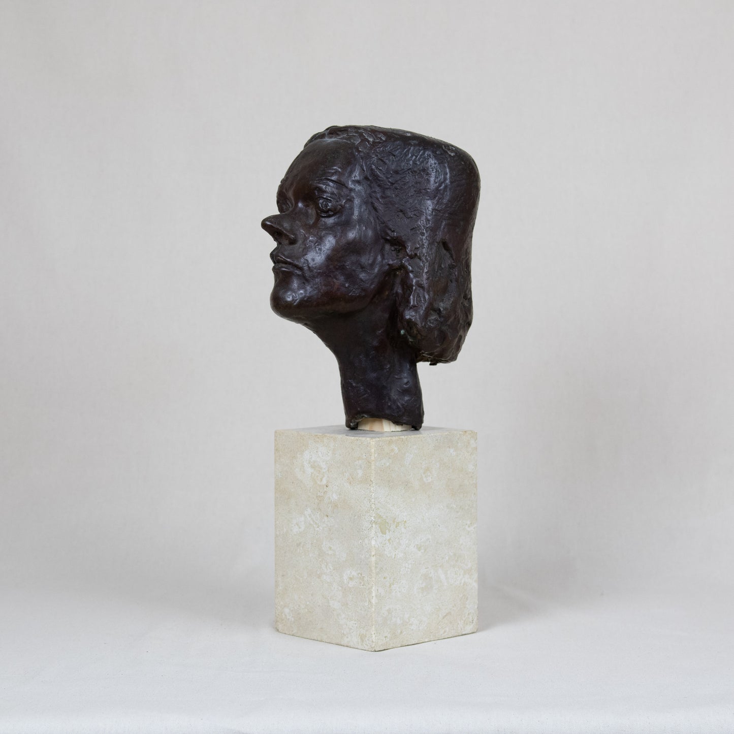 A modern bronze bust of a girl set atop a marble base, allegedly by Vincent Apap (1909 – 15 February 2003)*