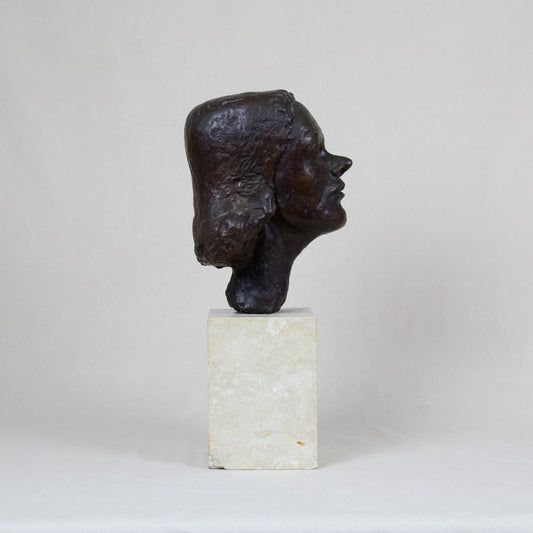 A modern bronze bust of a girl set atop a marble base, allegedly by Vincent Apap (1909 – 15 February 2003)*