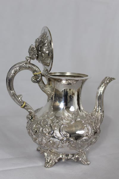 An impressive Four Piece Tea and Coffee Silver Service by renowned British silversmith, William Stroud