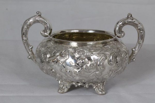 An impressive Four Piece Tea and Coffee Silver Service by renowned British silversmith, William Stroud