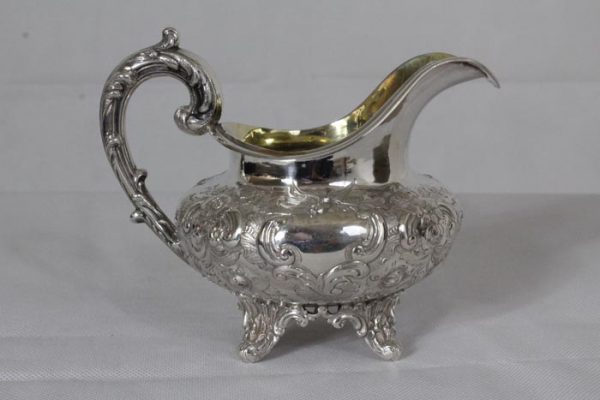 An impressive Four Piece Tea and Coffee Silver Service by renowned British silversmith, William Stroud