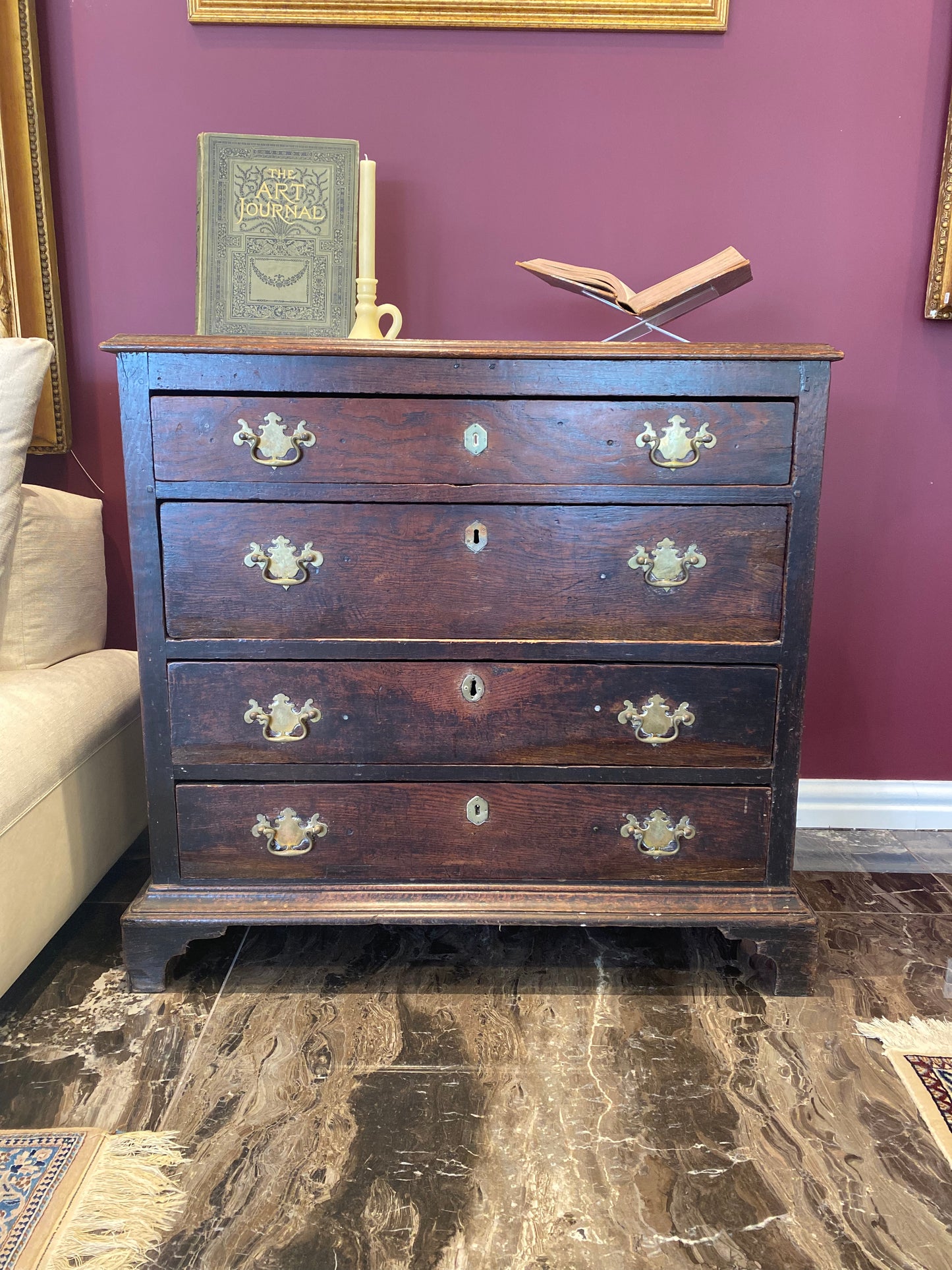 A handsome Collector's Early Georgian Oak Chest of Drawers with hand forged brass escutcheons