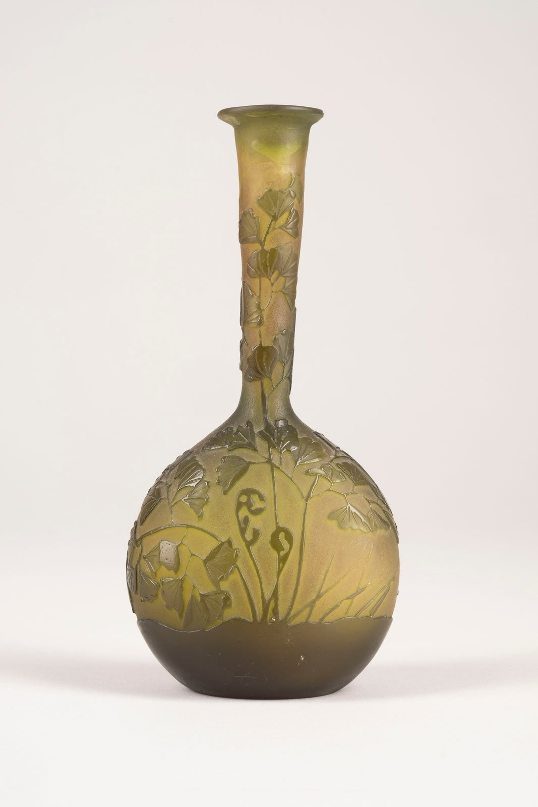 A rare Émile Gallé small green glass vase etched throughout with Ginko leaves c.1905.