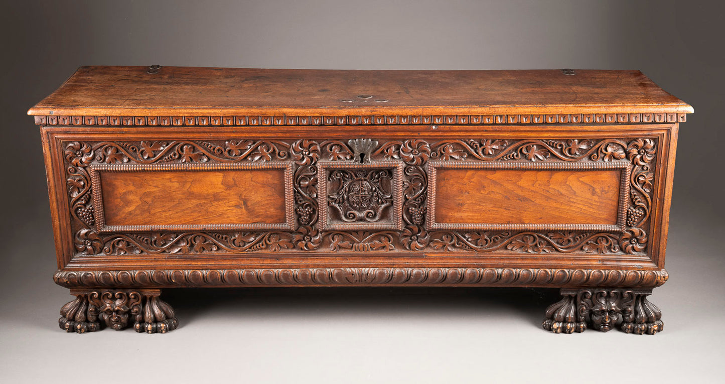 An Italianate imposing solid Walnut Cassone/trunk