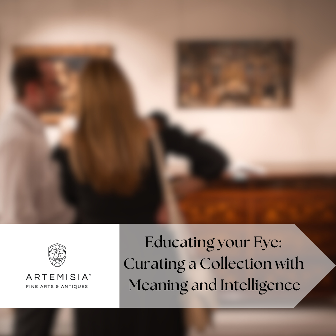 Two people standing in a room with a blurred background, featuring the Artemisia Fine Arts & Antiques logo.